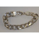 A STERLING SILVER CURB LINK BRACELET APPROX WEIGHT - 41.3G