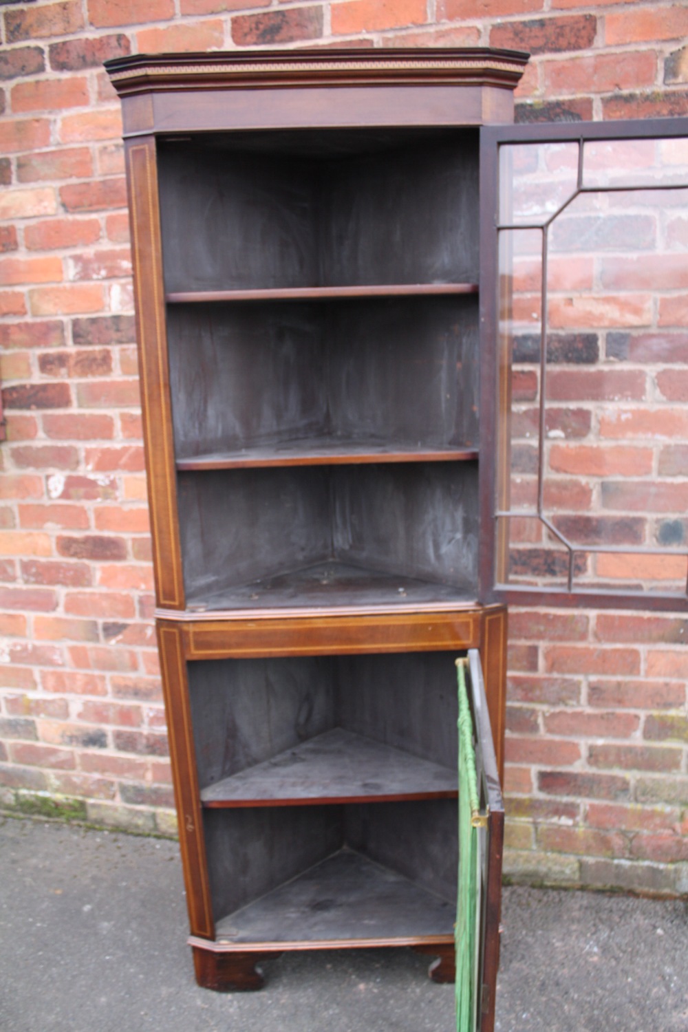 AN ANTIQUE MAHOGANY AND INLAID FLOOR STANDING CORNER CABINET, having two astragel glazed doors, H - Image 2 of 3