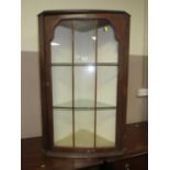 AN ANTIQUE WALNUT GLAZED HANGING CORNER CABINET H-100 CM