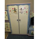 A MODERN PAINTED CHILDS LOW TWO DOOR WARDROBE H-155 W-95 CM