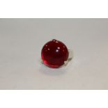 A MODERN SILVER / 925 DRESS RING SET WITH LARGE RED CABOCHON TYPE STONE - APPROX 11.7 G