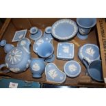 A TRAY OF BLUE WEDGWOOD JASPERWARE TO INCLUDE A TEAPOT, COMPORT ETC.