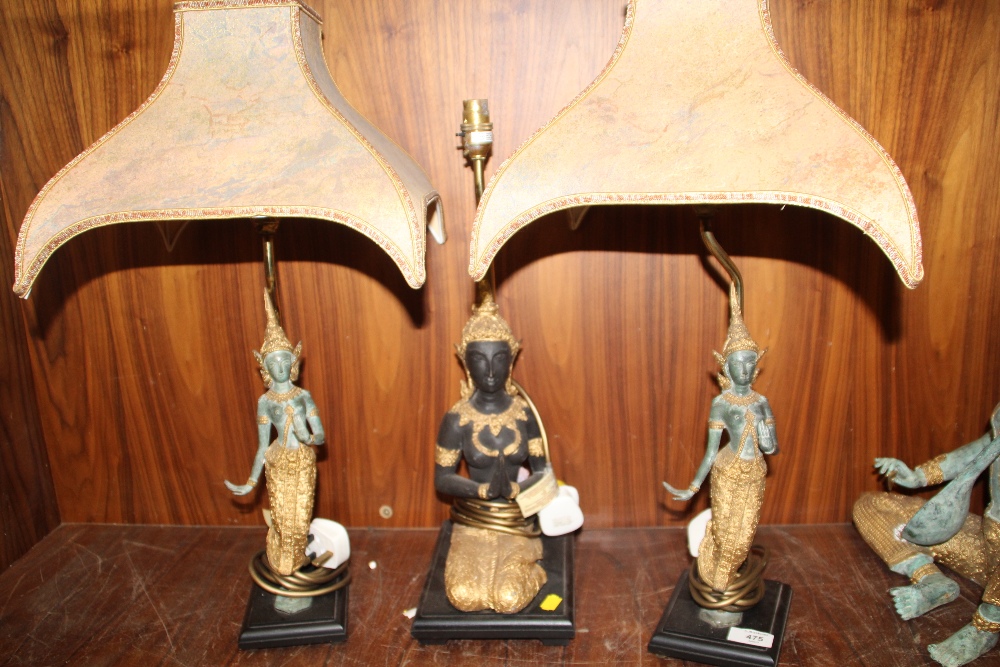 A PAIR OF EASTERN STYLE FIGURAL DEITY SHAPED TABLE LAMPS WITH SHADES, TOGETHER WITH ANOTHER (3)
