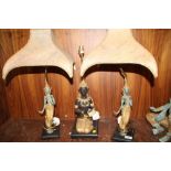 A PAIR OF EASTERN STYLE FIGURAL DEITY SHAPED TABLE LAMPS WITH SHADES, TOGETHER WITH ANOTHER (3)