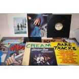 A COLLECTION OF LP RECORDS TO INCLUDE STATUS QUO, KISS, ACDC, PINK FLOYD ETC.