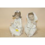 TWO NAO FIGURES OF YOUNG CHILDREN IN WHITE DRESSES