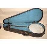 A CASED VINTAGE C.S BANJO