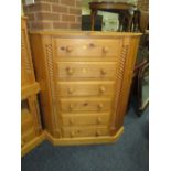 A PINE SIX DRAWER CORNER CHEST H-121 W-102 CM