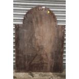 A LARGE VINTAGE CARVED MAHOGANY ARCHED TOPPED PANEL DEPICTING A BIRD WITH CURVED BEAK OVERALL SIZE -