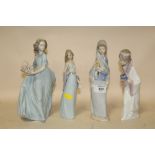 FOUR LLADRO LADY FIGURES TO INCLUDE LADIES HOLDING FLOWERS