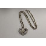 A STERLING SILVER HEART PENDANT ON CHAIN APPROX WEIGHT - 43.3G