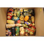 A COLLECTION OF WOODEN MATRYOSHKA RUSSIAN DOLLS