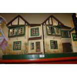 A VINTAGE WOODEN DOLLS HOUSE WITH DOLLS HOUSE FURNITURE