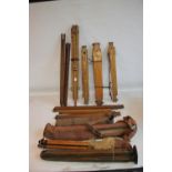 A TRAY OF VINTAGE OAK AND OTHER TRIPODS, to include cased examples A/F