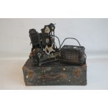 A CASED VINTAGE PATHESCOPE 9.5 CINE PROJECTOR with accessories