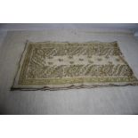 AN ANTIQUE MIDDLE EASTERN DOWRY SHAWL/CLOTH DECORATED WITH HEAVY EMBROIDERED GOLD AND SILVER WIRE