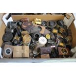 A TRAY OF ASSORTED VINTAGE PHOTOGRAPHIC LENSES, FILTER HOLDERS ETC.