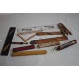 A COLLECTION OF VARIOUS WOODEN AND OTHER RULERS, to include folding types and a printed postal type