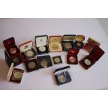 A COLLECTION OF BOXED VARIOUS PROOF AND UNC CROWN SIZED COINS, to include 1951 Festival of Britain