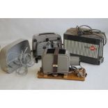 THREE VINTAGE SLIDE PROJECTORS to include an Opticis 100, Prinz Lancer II and a Eumig Mark 8