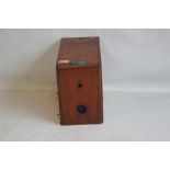 A FALLOWFIELDS FACILE DETECTIVE STYLE CAMERA IN MAHOGANY CASE