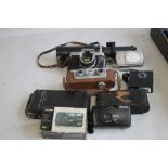 A TRAY OF ASSORTED MODERN CAMERAS AND ACCESSORIES to include an Olympus Camedia example