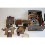 A LARGE COLLECTION OF ASSORTED VINTAGE PHOTOGRAPHIC AND MAGIC LANTERN LENSES, PLATES ETC.