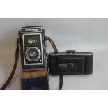 AN IKUFLEX TWIN LENS CAMERA AND AN AGFA CAMERA