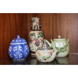 A COLLECTION OF ORIENTAL CERAMICS TO INCLUDE TEAPOTS, TWIN HANDLED VASE ETC.