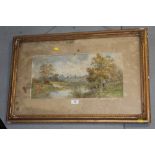 A GILT FRAMED AND GLAZED WATERCOLOUR OF A COUNTRY RIVER SCENE SIGNED W. REEVES LOWER RIGHT SIZE -