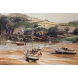 A FRAMED OIL ON CANVAS DEPICTING A RURAL BEACH SCENE WITH MOORED BOATS AND FIGURES SIGNED H. J.