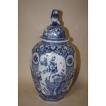 AN OCTAGONAL BLUE AND WHITE TEMPLE JAR AND COVER, decorated with birds and insects, H 43.5