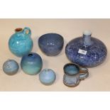 SEVEN PIECES OF BLUE STUDIO POTTERY TO INCLUDE WELSH PEPPERETTES AND BLOWN VASE MONOGRAMMED J.S.