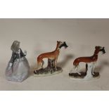 A LLADRO LADY FIGURE TOGETHER WITH A STAFFORDSHIRE STYLE GREYHOUND FIGURES, A/F