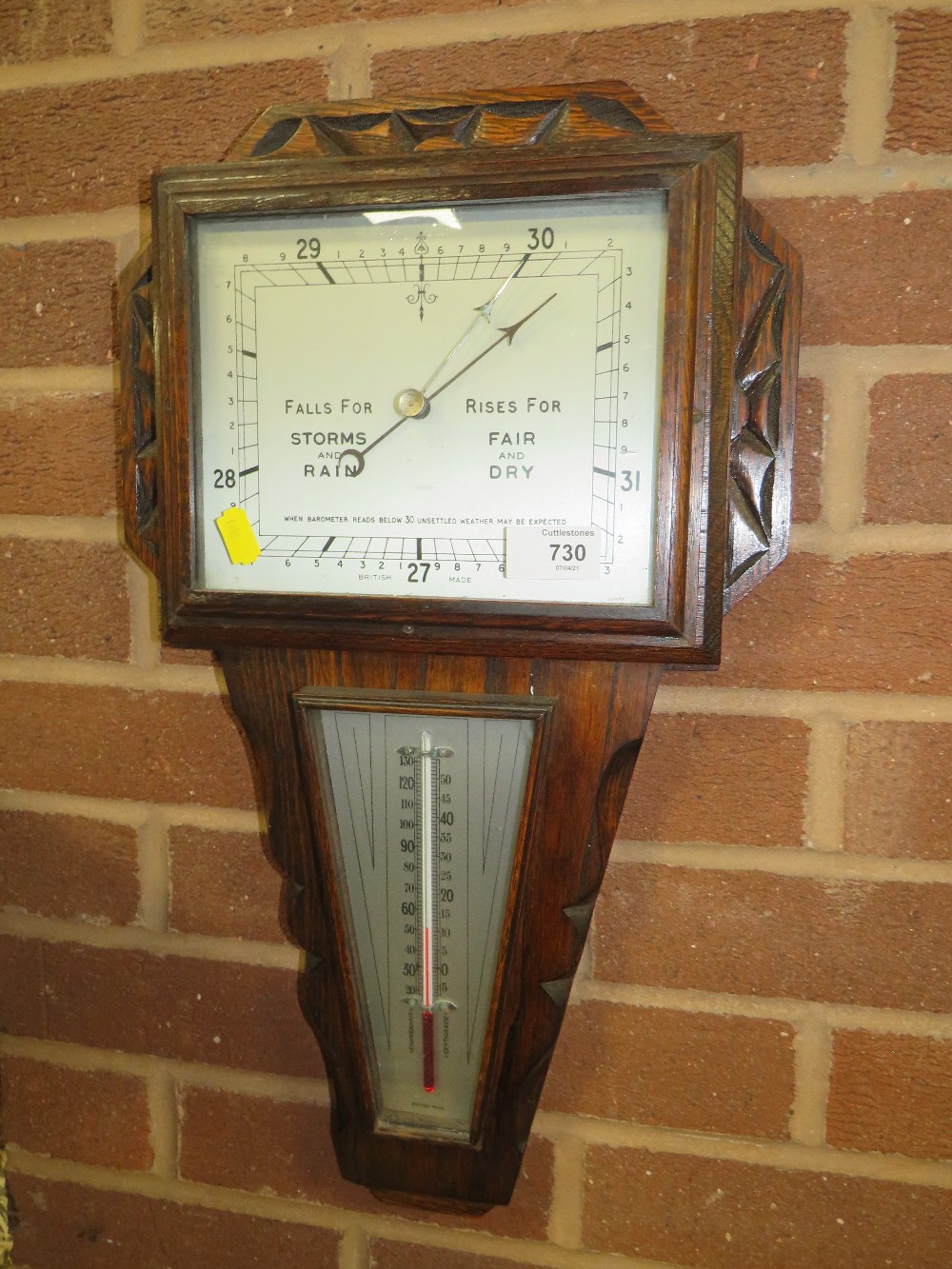 AN UNUSUAL ANGULAR OAK BAROMETER, H 55 CM, TOGETHER WITH ANOTHER SMALLER EXAMPLE (2)