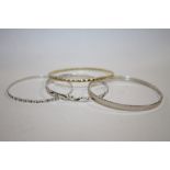 FOUR SILVER LADIES BANGLES - APPROX 27G