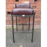 A MODERN DARK BROWN LEATHER BAR STOOL