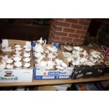 FOUR TRAYS OF ROYAL ALBERT OLD COUNTRY ROSES CHINA TO INCLUDE TEA AND COFFEE POTS, CAKE STAND,