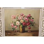 A FRAMED STILL LIFE OIL ON CANVAS STUDY OF ROSES IN A VASE INDISTINCTLY SIGNED LOWER RIGHT SIZE -