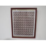 A SHEET OF 100 WW2 DEUTCHES REICH STAMPS SHOWING THE PROFILE OF ADOLF HITLER,SET IN A RED GLAZED