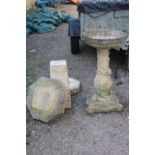 A STONE BIRDBATH WITH BIRD AND LEAF DETAIL ETC A/F