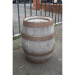 A LARGE METAL BANDED VINTAGE WOODEN BARREL FOR ELEY'S LTD. STAFFORD,, H 52.5 CM