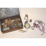 A TIN OF COLLECTABLES TO INCLUDE AN INGERSOLL POCKET WATCH, COINS AND BROOCHES ETC.