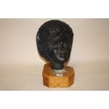 A PLASTER BUST OF LADIES HEAD RAISED ON WOODEN PLINTH, OVERALL HEIGHT 39 CM
