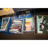 TWO TRAYS OF BOOKS, MAPS, GUIDES ETC. TOGETHER WITH TWO BOXES OF TOYS INCLUDING WADDINGTONS