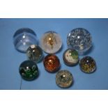 NINE GLASS PAPERWEIGHTS