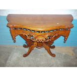 A SERPENTINE FRONTED ORNATE HALL TABLE (SOME DAMAGE BUT FIXABLE)