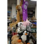 A LARGE QUANTITY OF SOFT TOYS TO INCLUDE MONKEYS, TEDDIES, DOGS ETC.