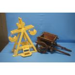 A WOODEN MODEL OF A FAIRGROUND RIDE TOGETHER WITH A WOODEN CART (2)