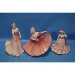 TWO ROYAL DOULTON FIGURINES 'JULIE' AND 'ELAINE' TOGETHER WITH A ROYAL WORCESTER FIGURINE 'JENNIFER'